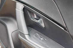 The doors up front combine leather touches with many cheap plastics for a mixed feeling of quality.